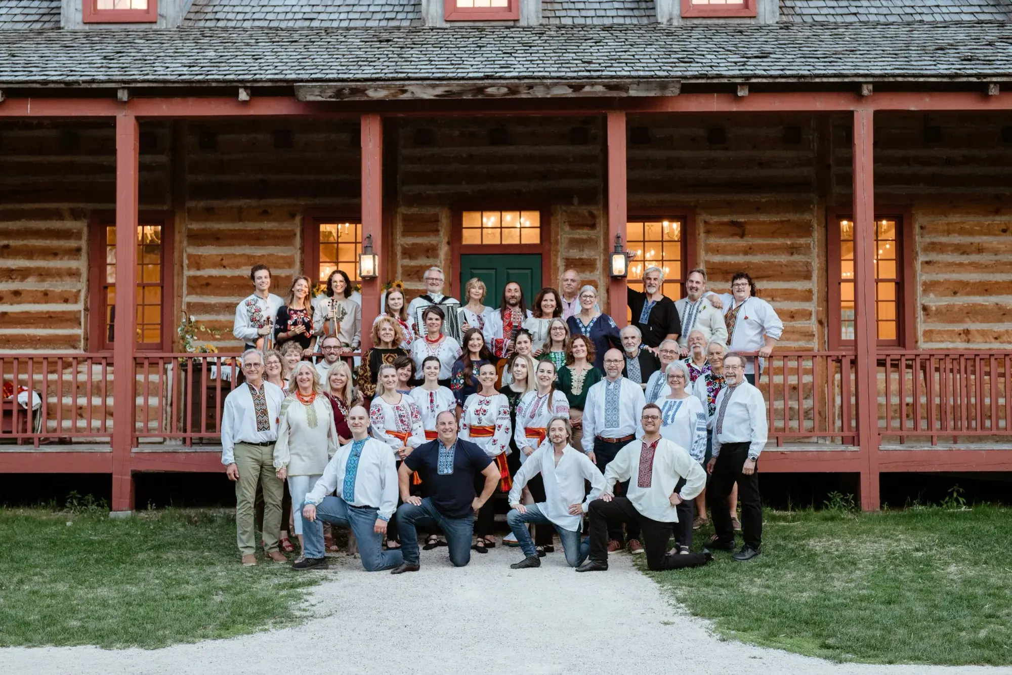 Melos Folk Ensemble — group portrait at golden hour